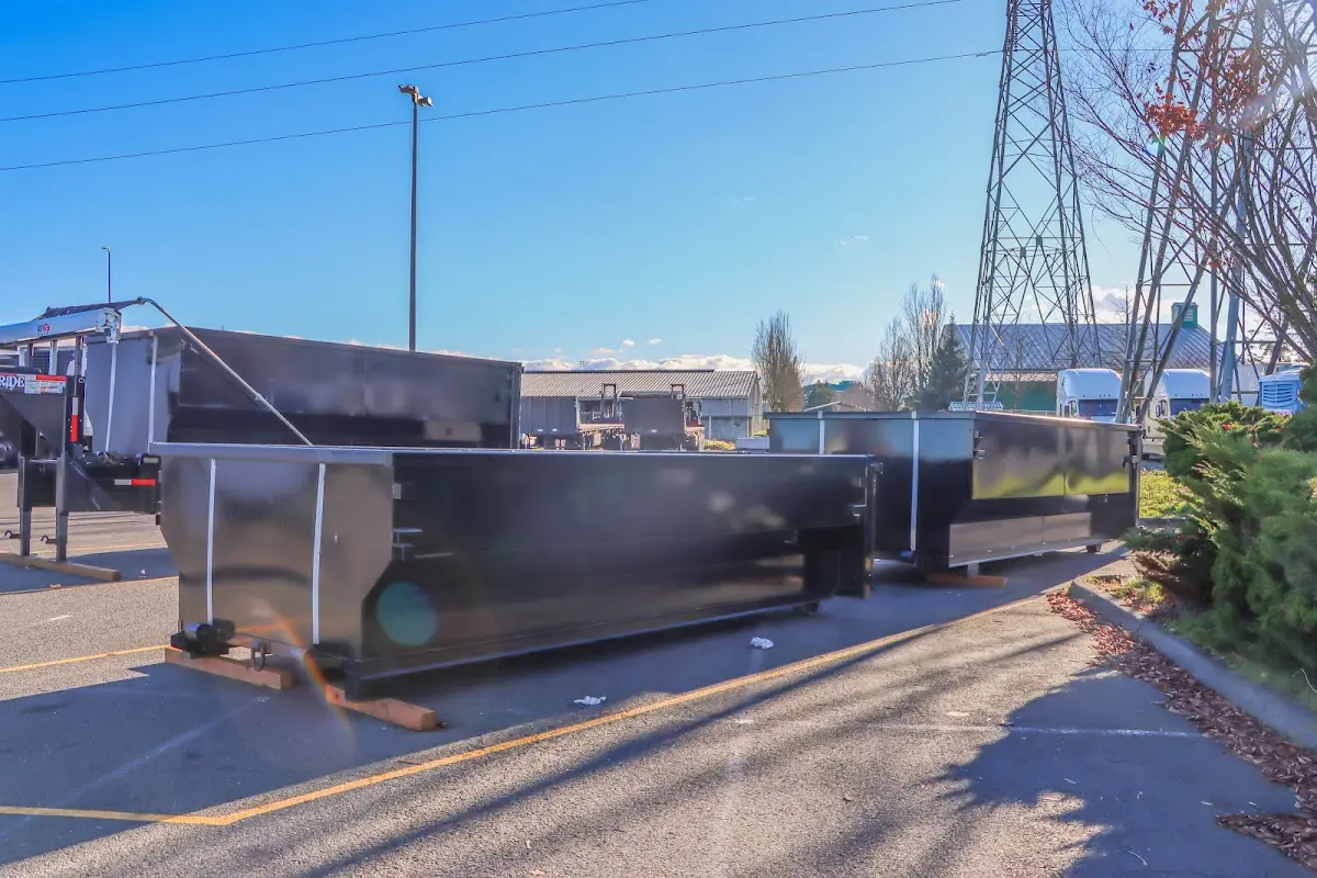 Roll-off dumpster ready for waste disposal at job site for 12 Yard Dumpster Rental in Roanoke